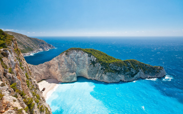 Large rock formation beach cliff free wallpaper - medium preview image