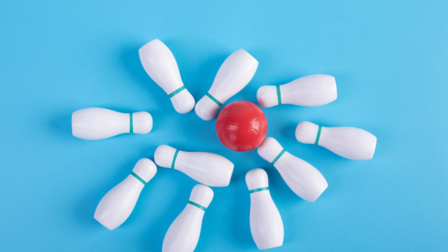 White plastic bowling pins red free wallpaper - medium preview image