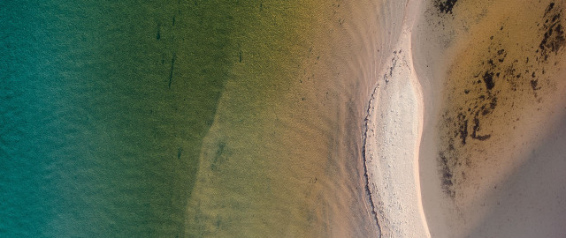 Aerial beach boat sand sunset free wallpaper - medium preview image