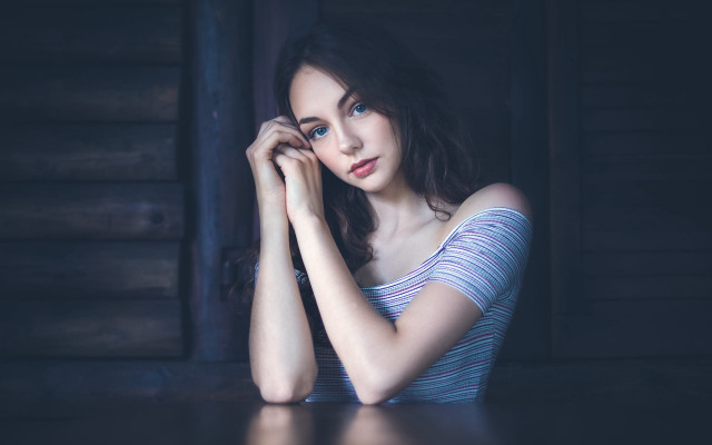 Woman serious look blue eyes free wallpaper - medium preview image
