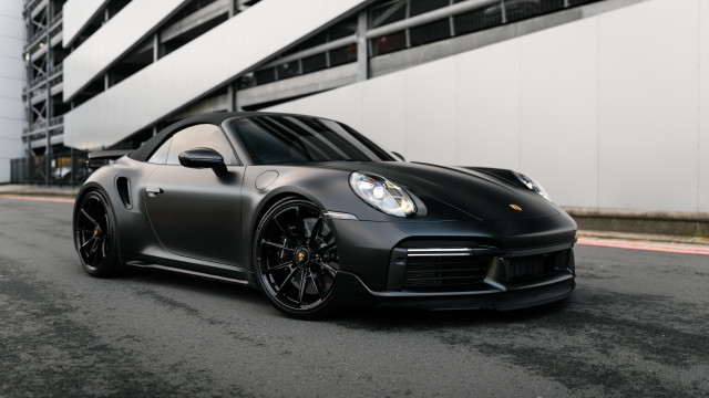 Grey sports car parked white free wallpaper - medium preview image