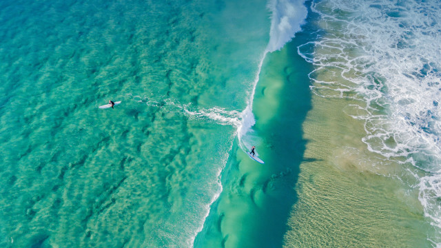 Surfing couple green ocean impressionist free wallpaper - medium preview image