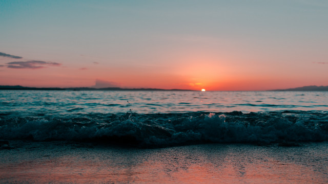 Sunset ocean waves island sky free wallpaper - medium preview image
