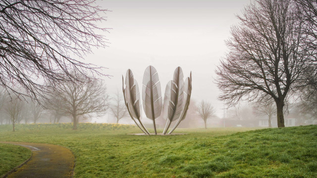 Metal sculpture grassy field fog free wallpaper - medium preview image