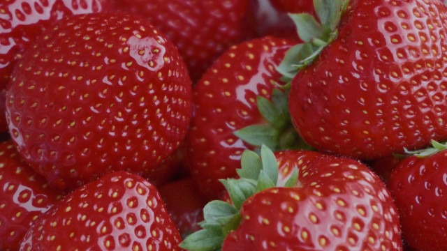 Strawberry closeup greenleaves redberries macro free wallpaper - medium preview image
