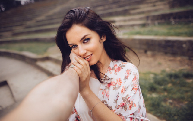 Romantic portrait woman holding hand free wallpaper - medium preview image