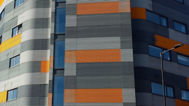 Skyscraper clock streetlight fence fishnets free wallpaper - medium preview image