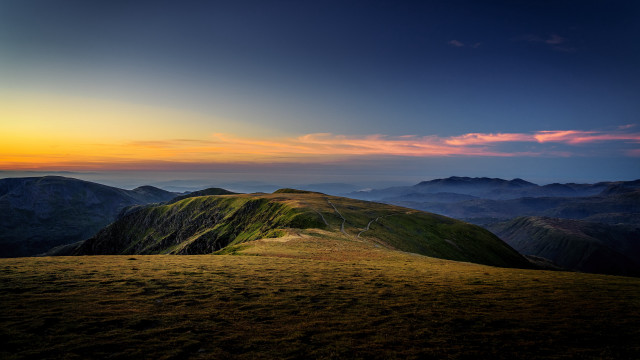 Grassy hill sunset clouds lake free wallpaper - medium preview image