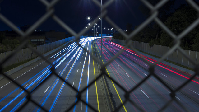 Night highway fence streetlight cityscape free wallpaper - medium preview image