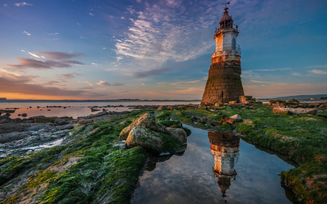 Lighthouse rocky shore sunset magic free wallpaper - medium preview image