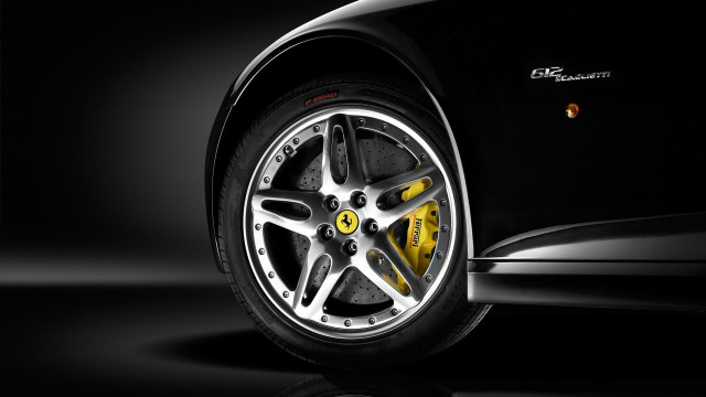 Car tire closeup black background free wallpaper - medium preview image