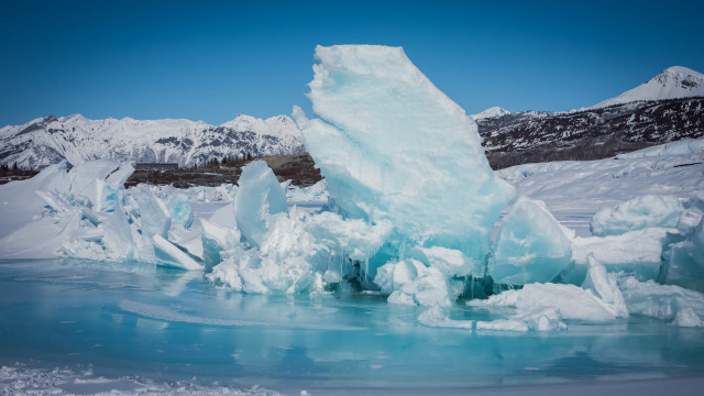 Iceberg lake mountains snowy sky free wallpaper - medium preview image