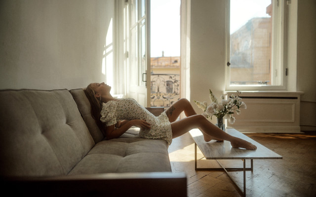 Woman couch livingroom photorealistic natural free wallpaper - medium preview image