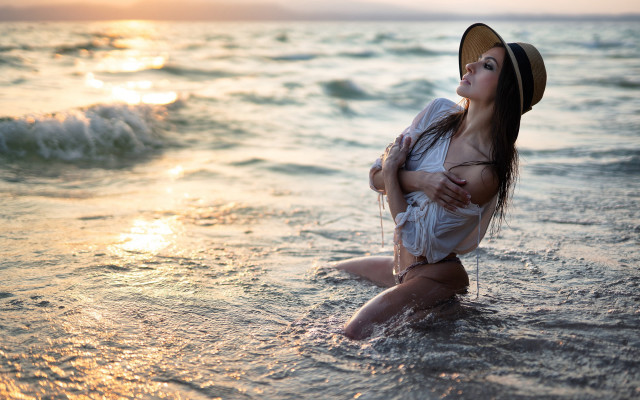 Woman hat beach sunset ocean free wallpaper - medium preview image
