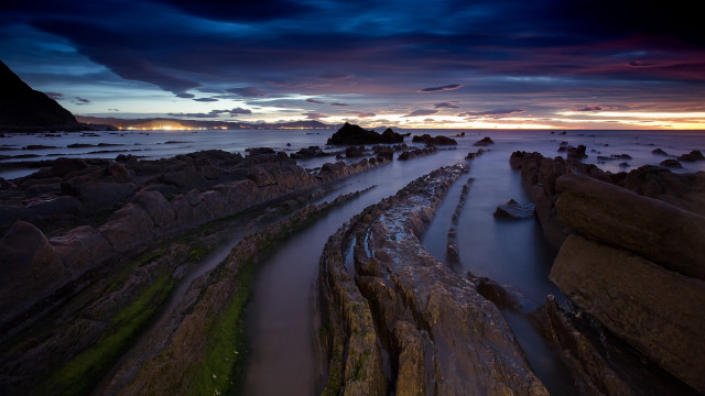 Sunset rocky beach water cloudy free wallpaper - medium preview image