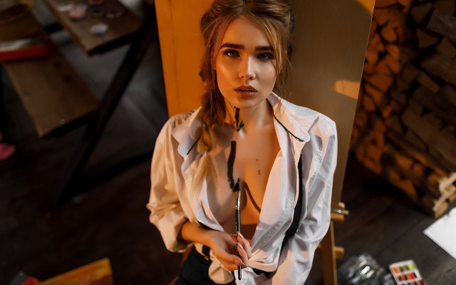 Woman shirt tie room fireplace free wallpaper - medium preview image