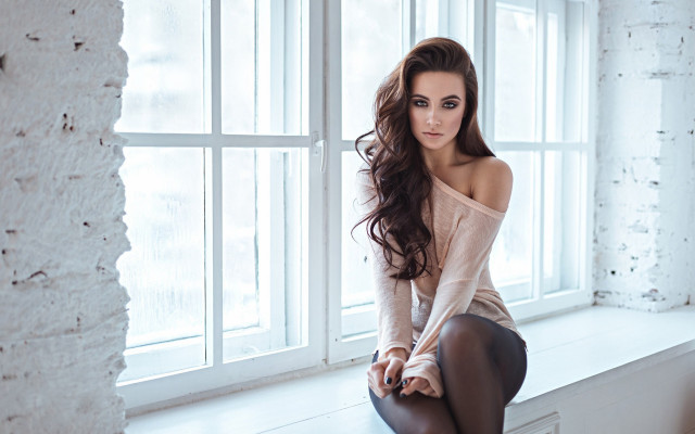 Woman sitting window sill brick free wallpaper - medium preview image