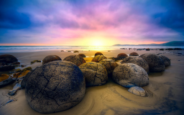 Rocks sandy beach cloudy sunset free wallpaper - medium preview image