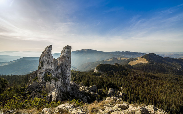 Rocky outcropping mountains trees blue free wallpaper - medium preview image