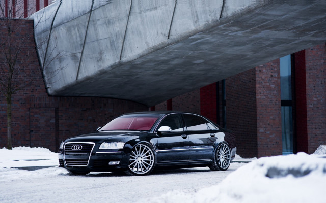 Black car snowy building bridge free wallpaper - medium preview image