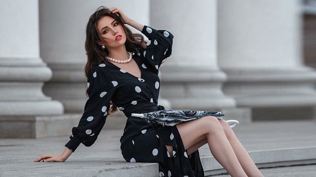 Woman sitting polka dot dress #2 free wallpaper - medium preview image