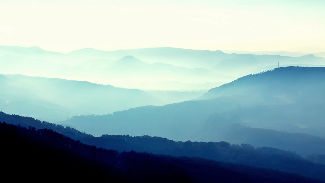 Mountain range hazy sky trees #2 free wallpaper - medium preview image