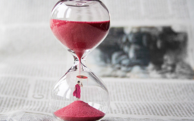 Red sandglass newspaper surreal city free wallpaper - medium preview image
