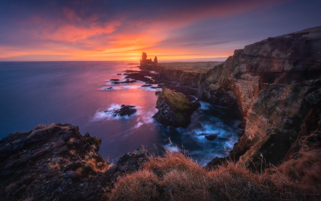 Sunset rocky cliff lighthouse dusk free wallpaper - medium preview image