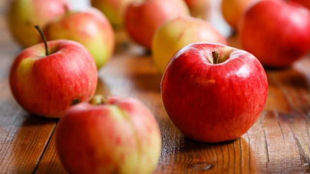 Red apples wooden table food free wallpaper - medium preview image