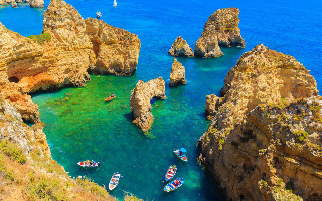 Boats rocks cliffs ocean beach free wallpaper - medium preview image
