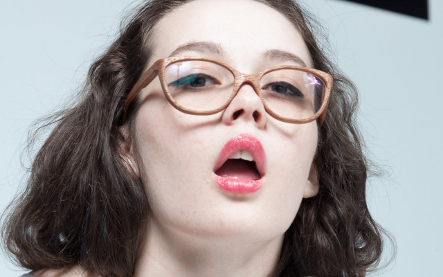 Woman glasses surprised face open free wallpaper - medium preview image