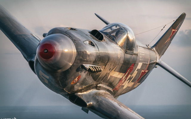 Silver airplane red nose cloudy free wallpaper - medium preview image