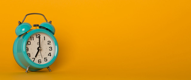 Blue alarm clock yellow wall free wallpaper - medium preview image