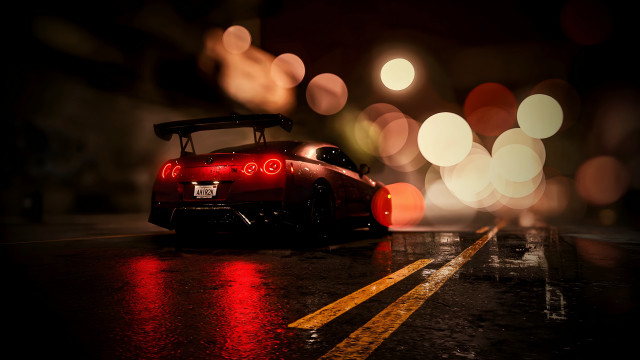 Red sports car night bokeh free wallpaper - medium preview image