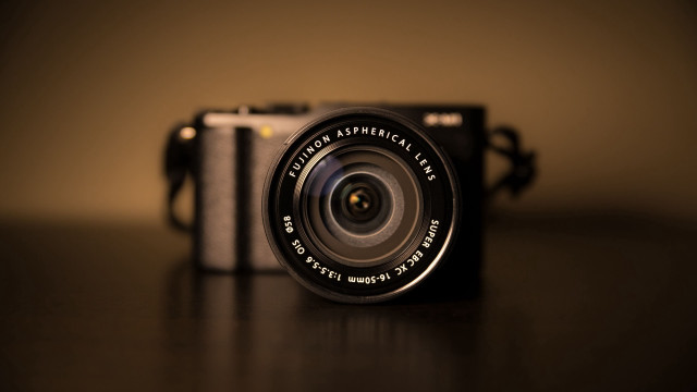 Camera table brown background black free wallpaper - medium preview image