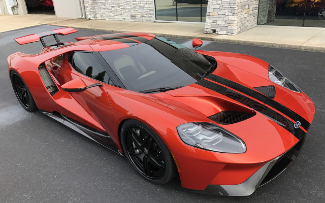 Red sports car building street free wallpaper - medium preview image