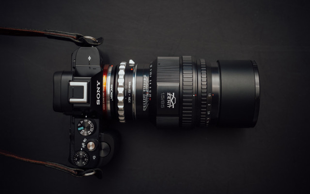 Camera lens strap black surface free wallpaper - medium preview image