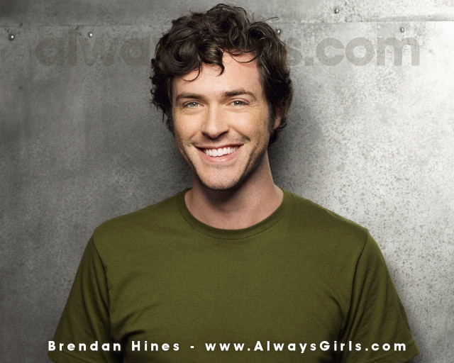 Man smiling green shirt black free wallpaper - medium preview image