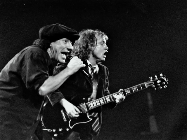Two men singing playing guitars free wallpaper - medium preview image