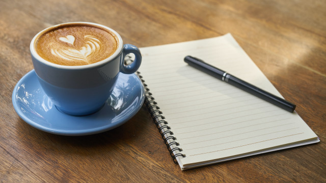 Coffee pen notepad wooden table free wallpaper - medium preview image
