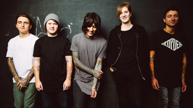Young men black wall group free wallpaper - medium preview image