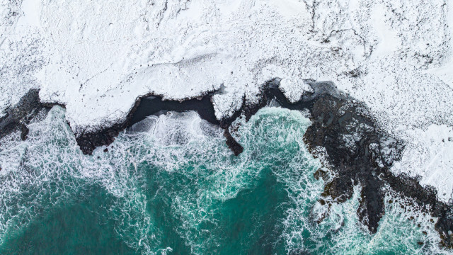 Aerial ocean rocks snow ice free wallpaper - medium preview image