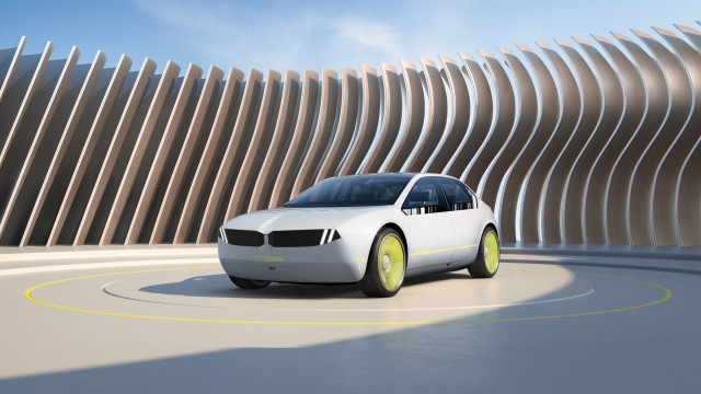 White car driving curved building free wallpaper - medium preview image
