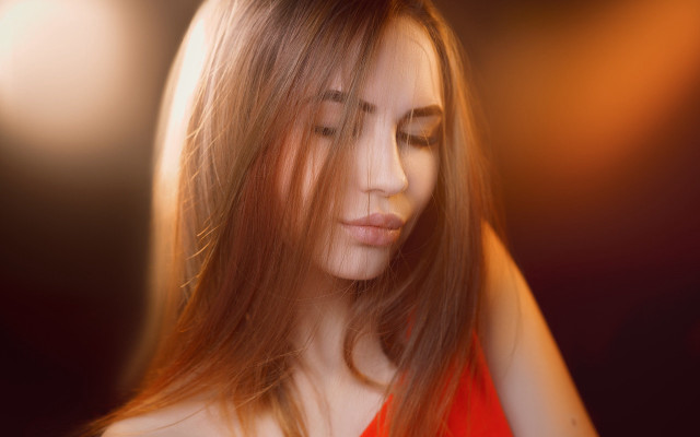 Woman longhair lookingdown cellphone hands free wallpaper - medium preview image