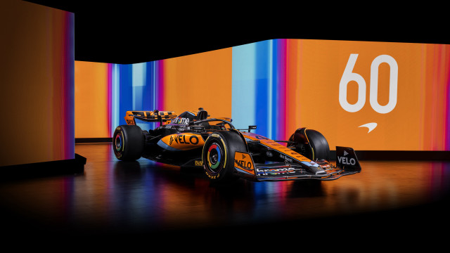 Yellow race car museum futurism free wallpaper - medium preview image