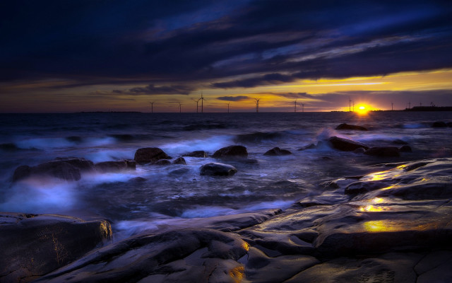 Sunset ocean waves rocks windmills free wallpaper - medium preview image