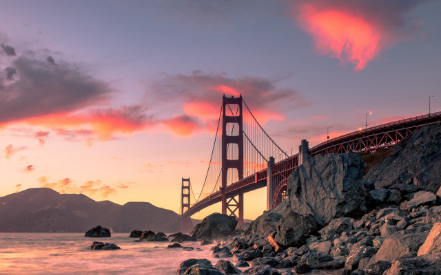 Bridge sunset rocky shore mountain free wallpaper - medium preview image