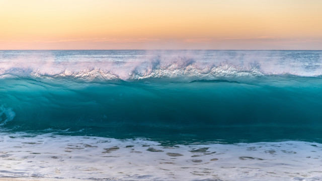 Large wave beach sunset person free wallpaper - medium preview image