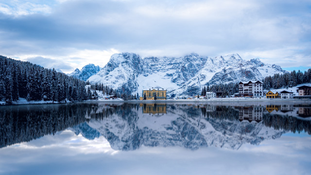 Mountain lake building snowy horizon free wallpaper - medium preview image