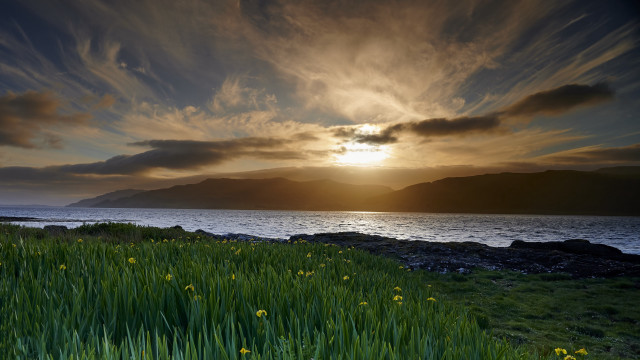 Sunset grass field mountains lake free wallpaper - medium preview image
